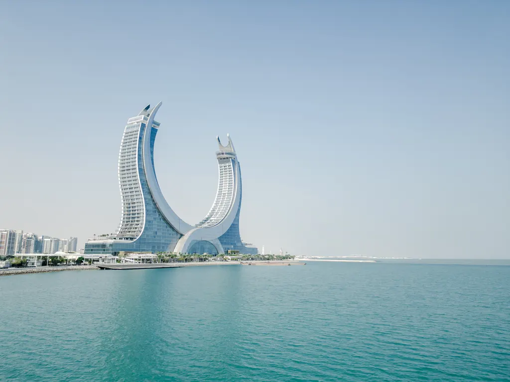 The crescent Katara Towers rising from the sea at Lusail, Doha